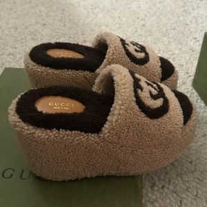 Gucci platform shearling slides